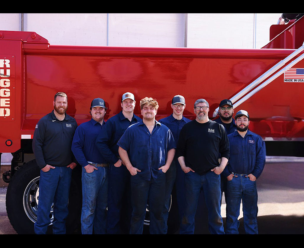 The Rugged Custom Truck Bodies team in front of a finished dump body